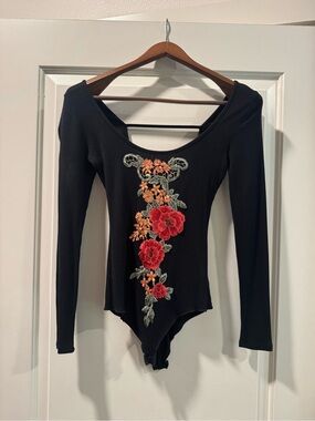 Black Ribbed Long-Sleeve Bodysuit with Red Floral Embroidery